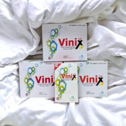 Tem ngậm Vinix chính hãng Hàn Quốc bốn hộp xếp trên nền vải trắng - Nhà thuốc Trung Thắng